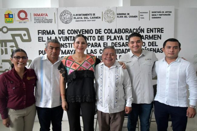 firma del convenio entre INMAYA y el Ayuntamiento de Playa del Carmen para promover la cultura maya con Eder Enrique Chuc Cen y Estefanía Mercado Asencio.